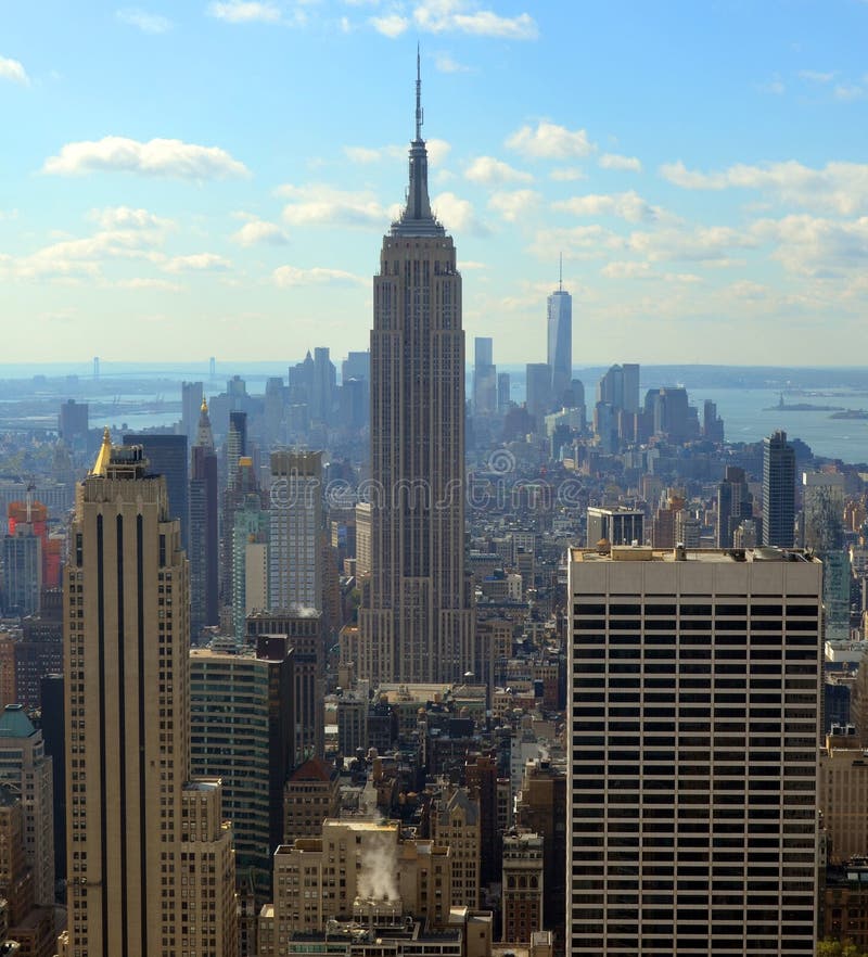 NEW YORK CITY, NY - OCT 29: Midtown and the Empire State Building on oct. 29, 2013 in New York City. Empire State Building is a 102-story landmarnd was world`s tallest building for more than 40 years. NEW YORK CITY, NY - OCT 29: Midtown and the Empire State Building on oct. 29, 2013 in New York City. Empire State Building is a 102-story landmarnd was world`s tallest building for more than 40 years