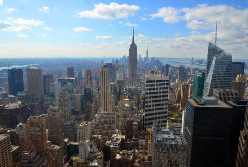 NEW YORK CITY, NY - OCT 29: Midtown and the Empire State Building on oct. 29, 2013 in New York City. Empire State Building is a 102-story landmarnd was world`s tallest building for more than 40 years. NEW YORK CITY, NY - OCT 29: Midtown and the Empire State Building on oct. 29, 2013 in New York City. Empire State Building is a 102-story landmarnd was world`s tallest building for more than 40 years