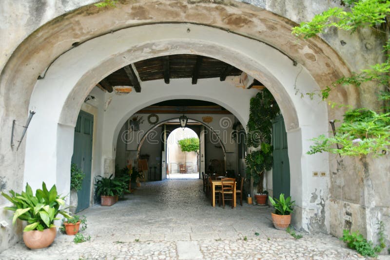 Entrance arch in an ancient noble house in a medieval town in the province of Benevento. Entrance arch in an ancient noble house in a medieval town in the province of Benevento.