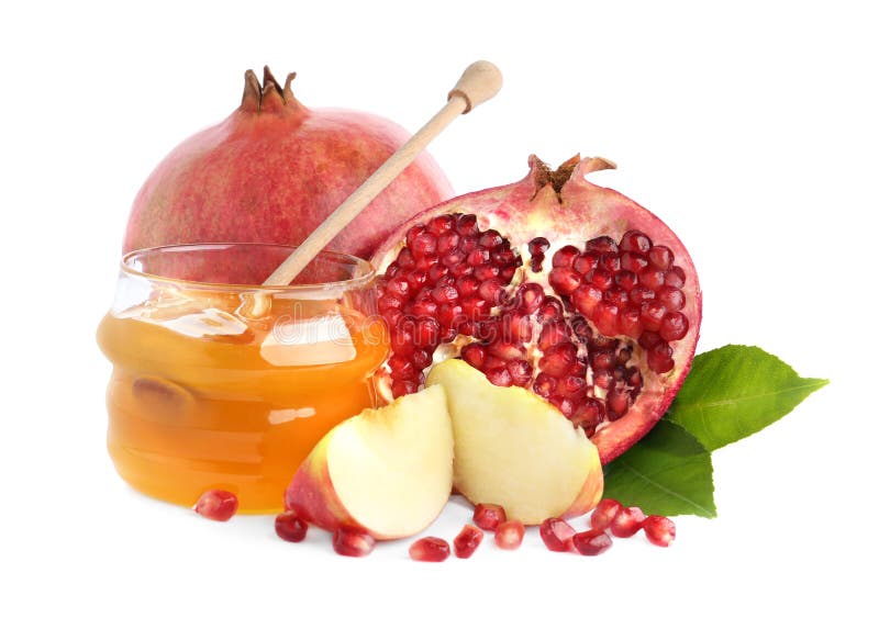 Honey, apples and pomegranate on white background. Rosh Hashanah holiday. Honey, apples and pomegranate on white background. Rosh Hashanah holiday