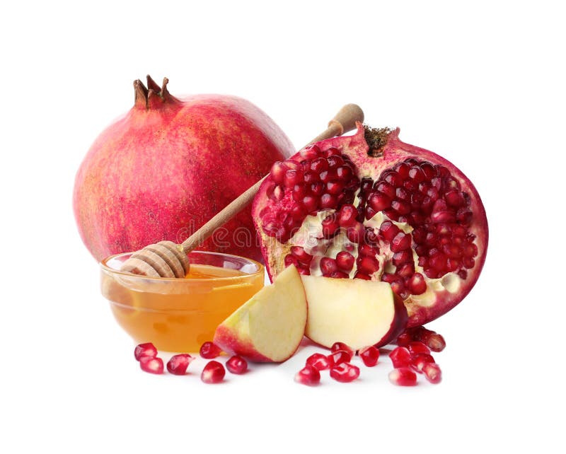 Honey, apples and pomegranate on white background. Rosh Hashanah holiday. Honey, apples and pomegranate on white background. Rosh Hashanah holiday