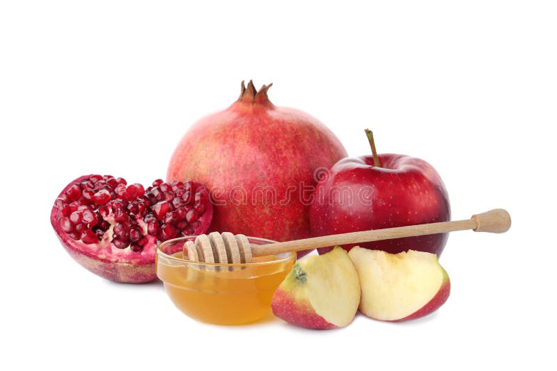 Honey, apples and pomegranate on white background. Honey, apples and pomegranate on white background