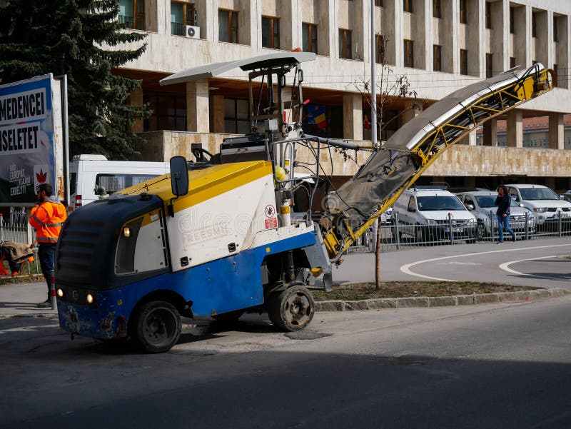 Road construction machinery on the street. stock photo Road construction machinery on the street. stock photo