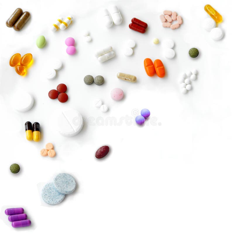 Medicine and healthcare background pattern. Colorful top left corner composition of mixed pills, tablets and capsules isolated on white. Medicine and healthcare background pattern. Colorful top left corner composition of mixed pills, tablets and capsules isolated on white.