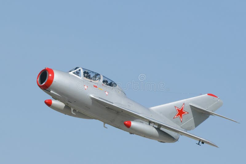 A Mikoyan-Gurevich MiG-15 two-seater jet fighter with Soviet markings. The MiG-15 was developed for the USSR by Artem Mikoyan and Mikhail Gurevich. It was one of the first successful swept-wing fighters, and achieved fame during the early phases of the Korean war where it outclassed the planes of the anti-communist forces.