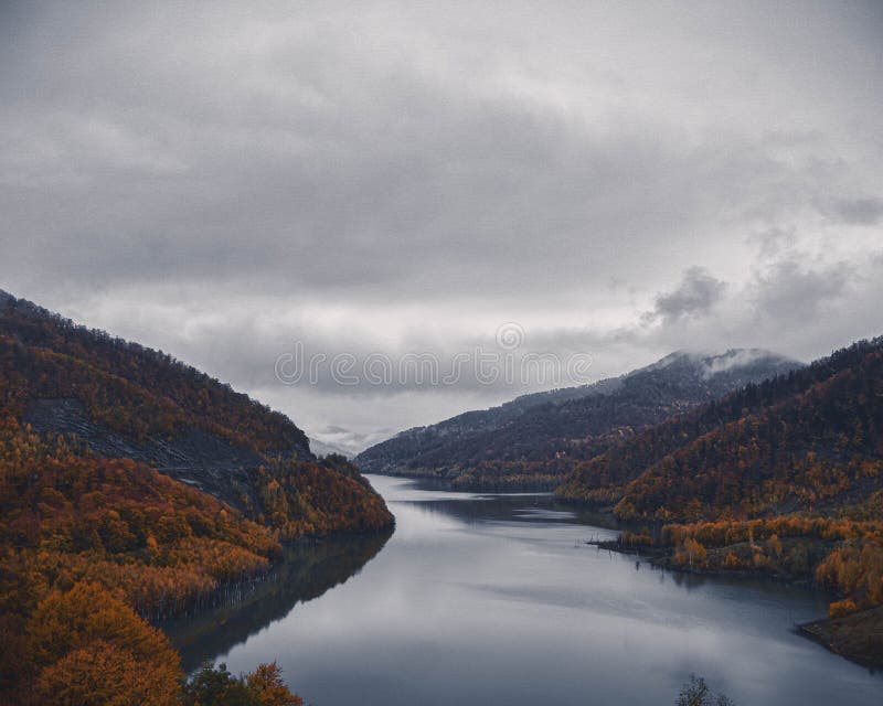 A photo on a autumn day.  Lake in the forest. A photo on a autumn day.  Lake in the forest