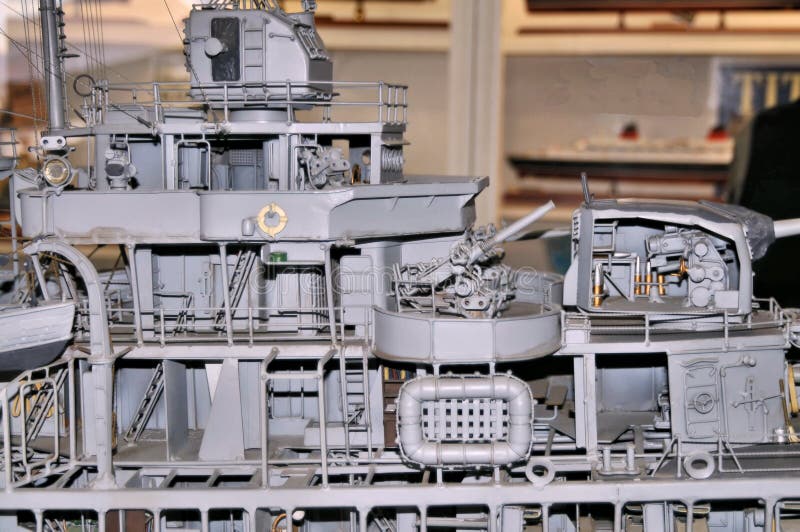 This is a cutaway view of the midship section of the destroyer USS Sullivans. Besides the bridge, there is a view of one of the gun turrets which has a 130mm cannon. Behind the turret is an anti aircraft gun.  There is also a life raft. This is a cutaway view of the midship section of the destroyer USS Sullivans. Besides the bridge, there is a view of one of the gun turrets which has a 130mm cannon. Behind the turret is an anti aircraft gun.  There is also a life raft.