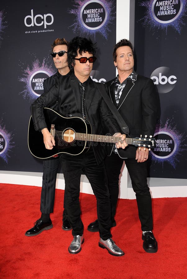 Mike Dirnt, Billie Joe Armstrong and Tré Cool of Green Day royalty free stock image Mike Dirnt, Billie Joe Armstrong and Tré Cool of Green Day royalty free stock image