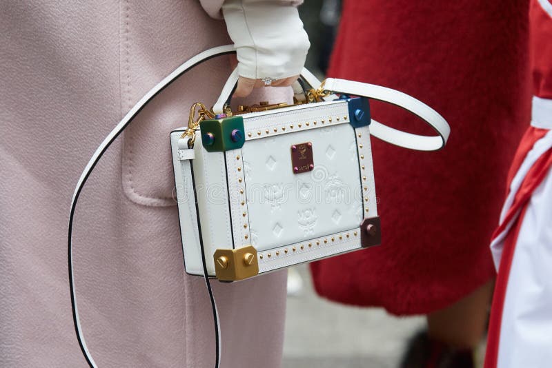 Woman with White Leather MCM Bag and Pink Coat before Max Mara Fashion ...