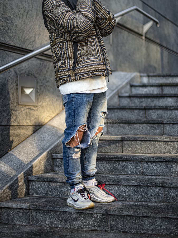 Young Man Wearing a Pair of Nike Air Max 97 Off-White Editorial Stock Photo  - Image of running, shoelace: 191371758