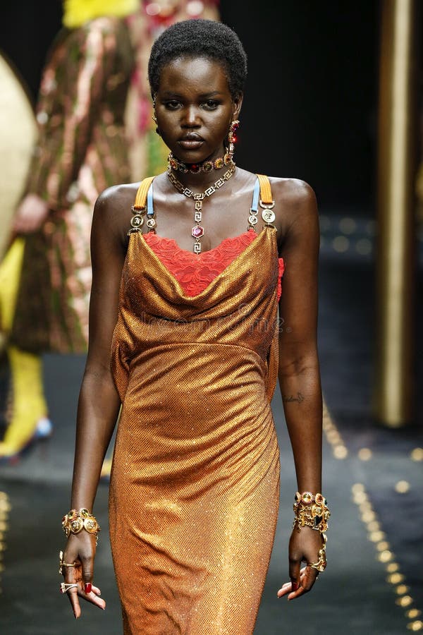 Adut Akech walks the runway at the Versace show at Milan Fashion Week Autumn/Winter 2019/20
