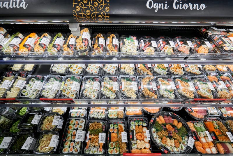 Milan, Italy - January 21 2019: sushi and rolls for sale in shop in Milan. Milan Central Station. Sapori and Dintorni