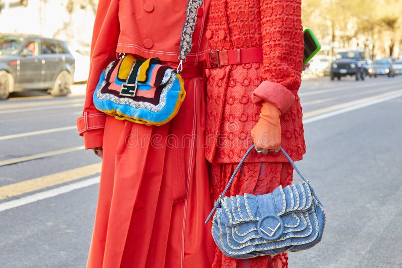 Woman with orange Fendi bag before Genny fashion show, Milan Fashion Week street  style on September 22, 2016 in Milan Stock Photo - Alamy