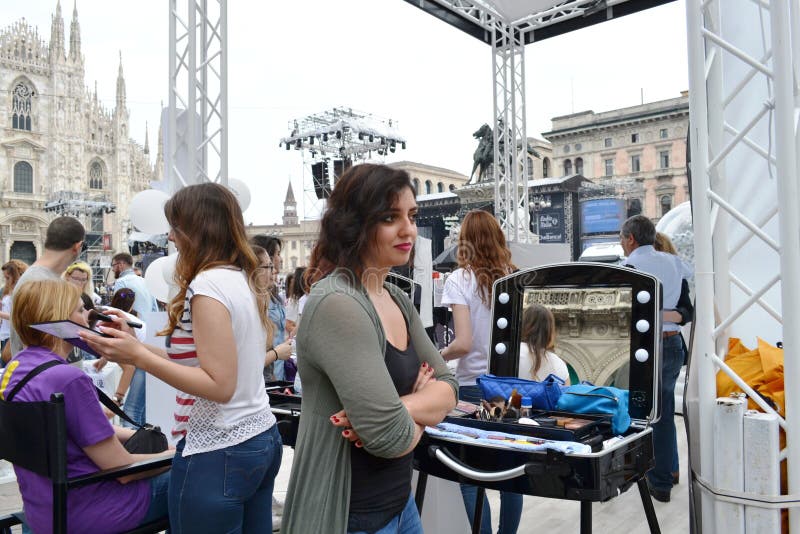Beauticians receiving customers for free outdoors photo set `Brosway` in Milan Duomo square. royalty free stock photo Beauticians receiving customers for free outdoors photo set `Brosway` in Milan Duomo square. royalty free stock photo