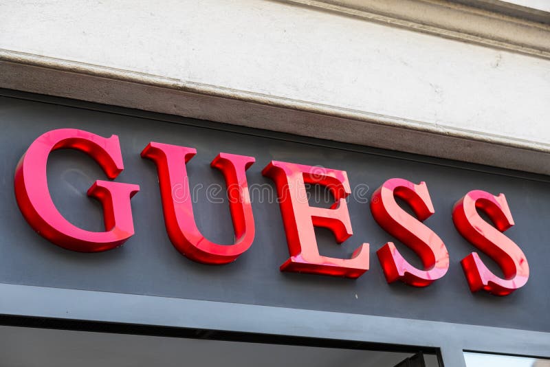 A Logo of Guess Brand of a Side of a Store in the Mall of New York ...