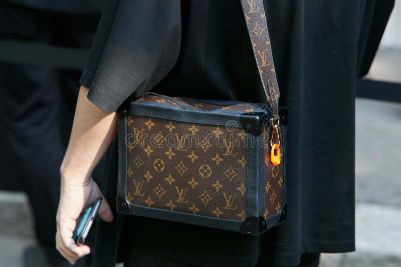 MILAN, ITALY - JANUARY 12, 2019: Man with brown Louis Vuitton backpack and  black padded jacket before Frankie Morello fashion show, Milan Fashion Week  Stock Photo - Alamy