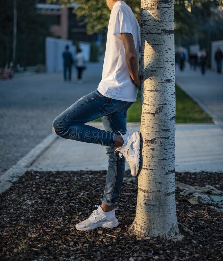 Teenager a Pair White Nike Huarache, Denim and Hoodie Editorial Stock Photo - Image of item, isolated: 168876538