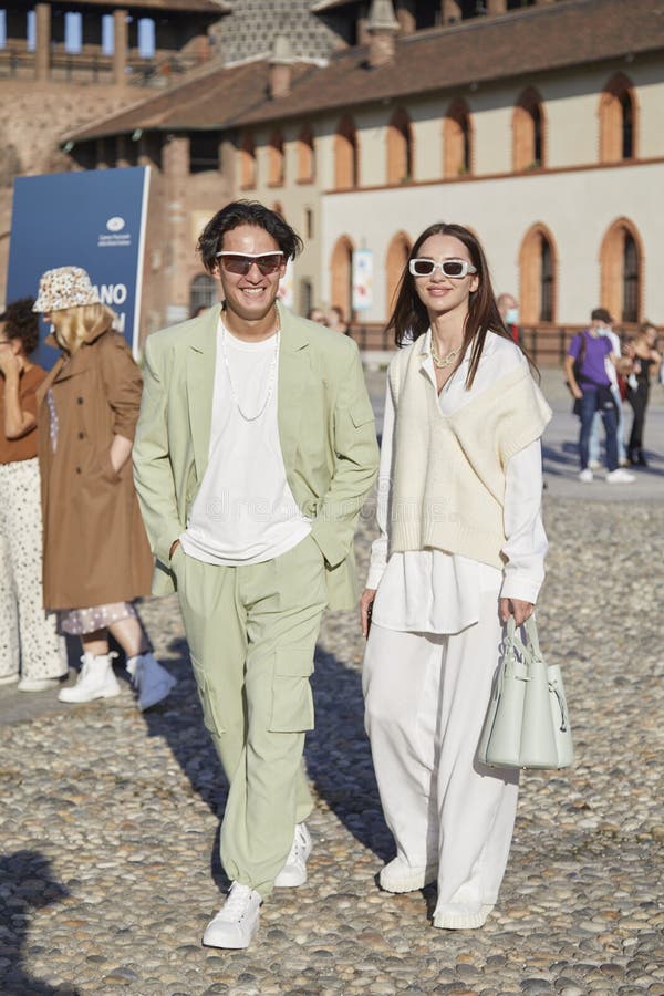 MILAN, ITALY - JANUARY 13, 2019: Man with Louis Vuitton bag and green scarf  before Reshake fashion show, Milan Fashion Week street style Stock Photo -  Alamy