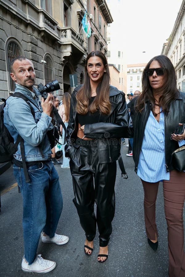 MILAN - JUNE 15: Woman with gray and white checkered Louis Vuitton bag  before Alberta Ferretti fashion show, Milan Fashion Week street style on  June 1 Stock Photo - Alamy