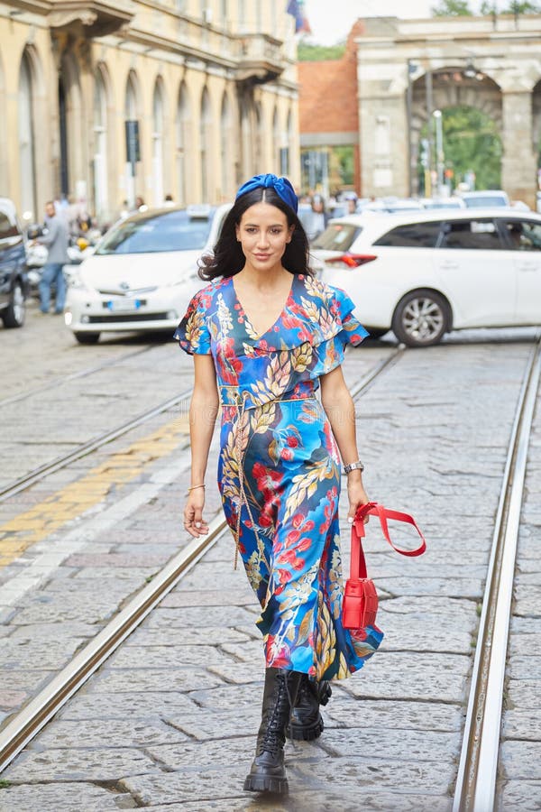 MILAN, ITALY - SEPTEMBER 18, 2019: Woman with black leather Fendi bag and  floral dress before Peter Pilotto fashion show, Milan Fashion Week street  st Stock Photo - Alamy