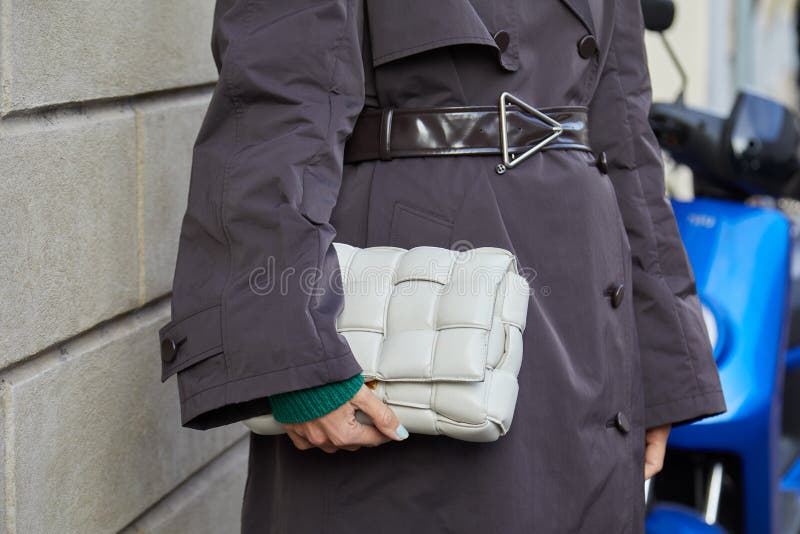 MILAN - JANUARY 13: Man with brown coat and Gucci belt looking at  smartphone before Emporio Armani fashion show, Milan Fashion Week street  style on Ja Stock Photo - Alamy