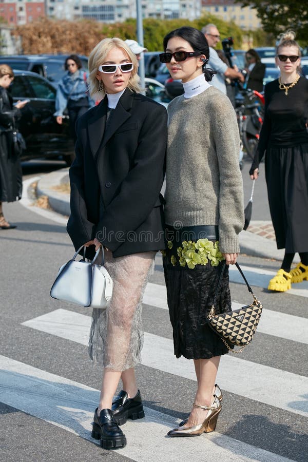 MILAN, ITALY - SEPTEMBER 24, 2021: Woman with black cargo trousers and pink  and black sunglasses before Prada fashion show, Milan Fashion Week street  Stock Photo - Alamy