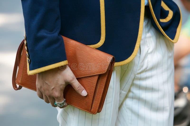 MILAN, ITALY - JANUARY 12, 2019: Man with brown Louis Vuitton backpack and  black padded jacket before Frankie Morello fashion show, Milan Fashion Week  Stock Photo - Alamy