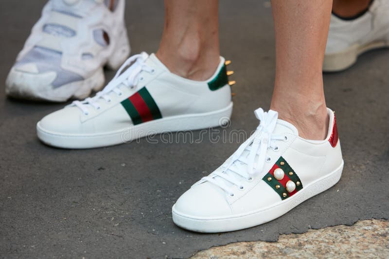 Man with Gucci Sneakers with Floral Decoration before Salvatore