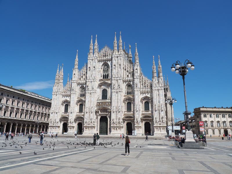 Milano, Italy. The main facade of the Dome and the square. The famous Cathedral in Milan. The church is a main landmark stock photo Milano, Italy. The main facade of the Dome and the square. The famous Cathedral in Milan. The church is a main landmark stock photo