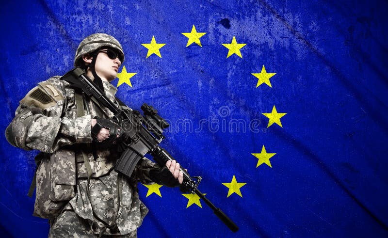 Soldier holding rifle on a European Union flag background. Soldier holding rifle on a European Union flag background