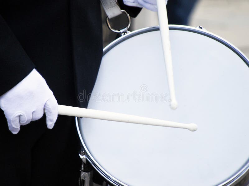 Closeup of military bandsman playing drums. Closeup of military bandsman playing drums