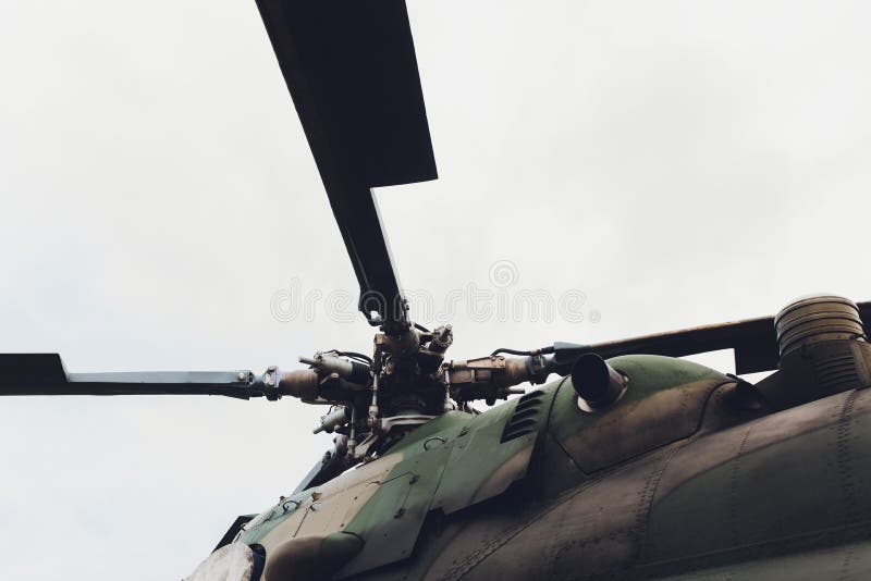 Military helicopter rotor blade detail close up.