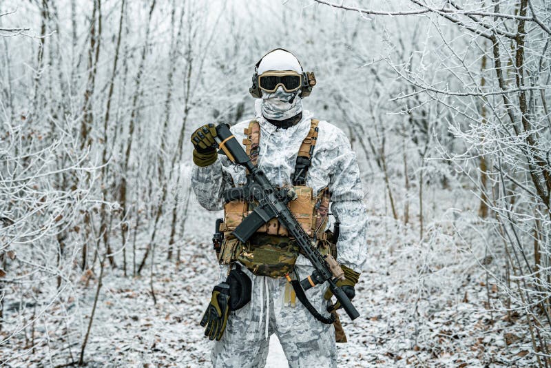 Military Man in White Camouflage Uniform with Machinegun. Soldier in ...