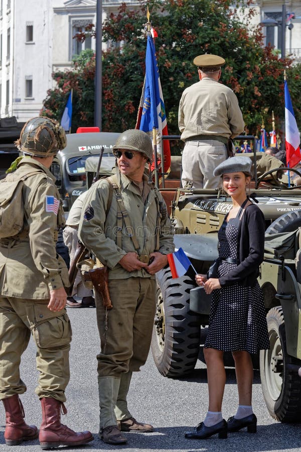 Military men, trucks and young woman in Lyon royalty free stock photos Military men, trucks and young woman in Lyon royalty free stock photos