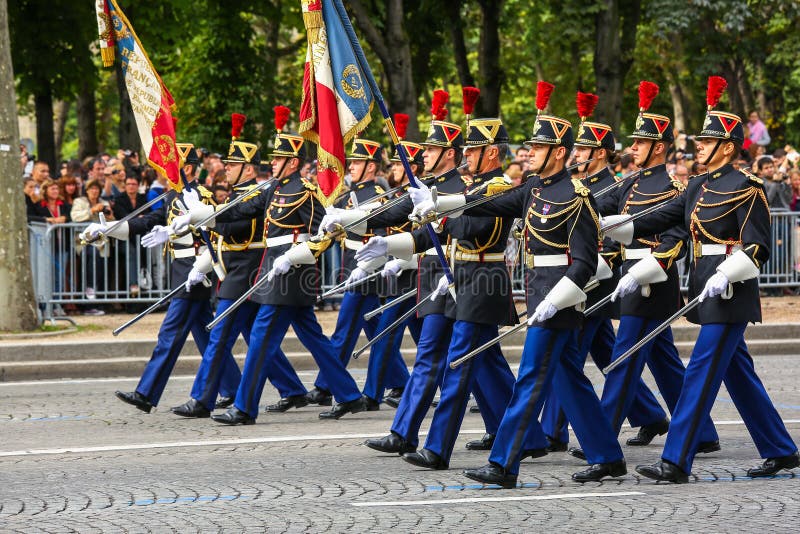 Military parade (Defile) during the ceremonial of french national day, Champs Elysee avenue. stock photo Military parade (Defile) during the ceremonial of french national day, Champs Elysee avenue. stock photo