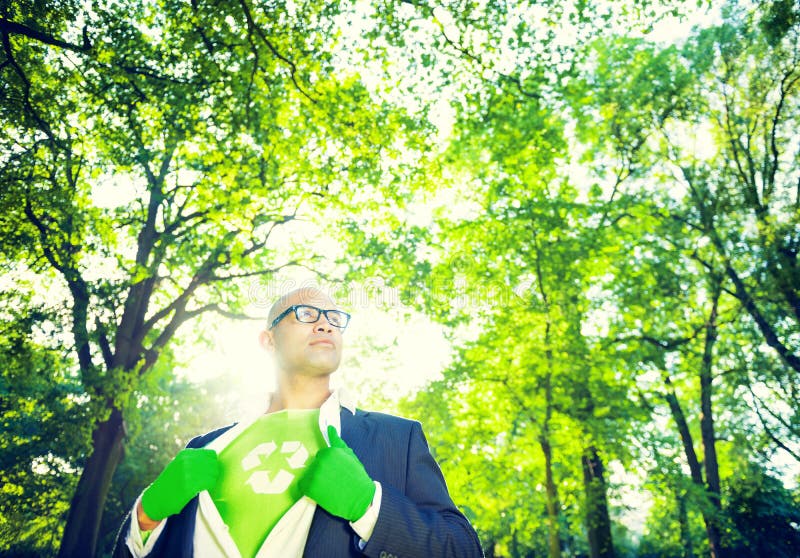 Miljövårdaffärsman i Superherotema arkivfoto Miljövårdaffärsman i Superherotema arkivfoto
