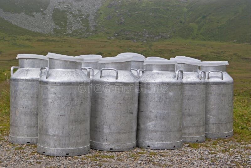 Milk cans - you wait for the milk truck. Mountain milk stock images, royalty-free photos and pictures
