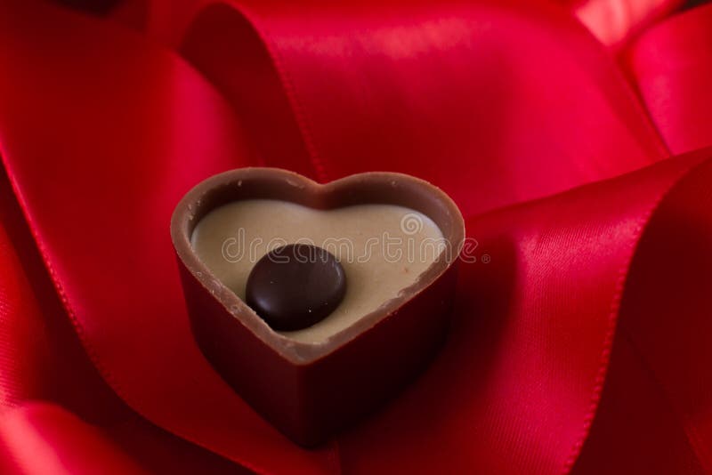 Milk Chocolate with Caramel Cream in a Heart Shape Stock Photo Image