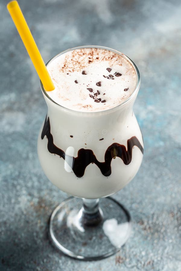Milk Chocolate Cocktail on Concrete Stone Background. Vertical Image