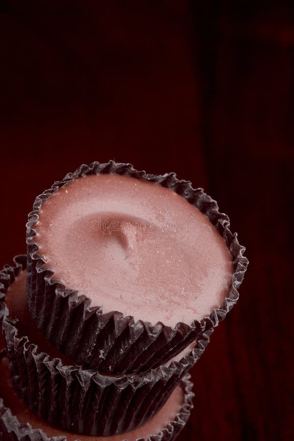 Milk chocolate cups stock image. Image of delicious, studio 32990377