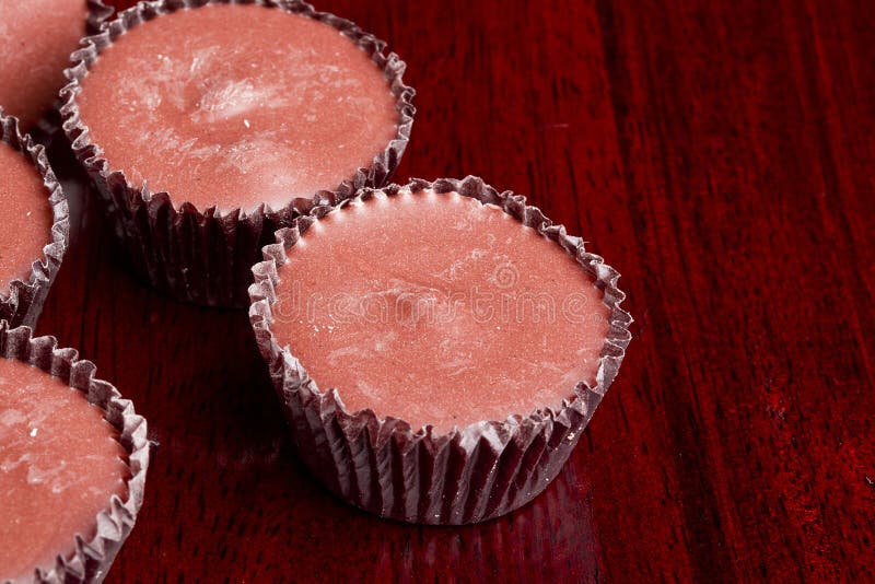 Milk chocolate cups stock photo. Image of background 33237580