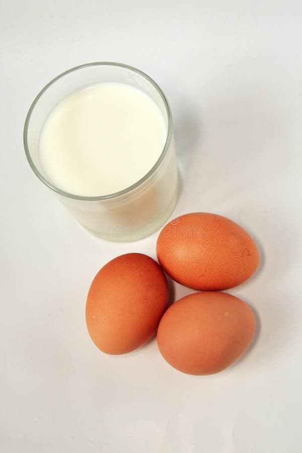 A Glass Of Milk And Two Eggs Stock Image Image of food, drink 17378757