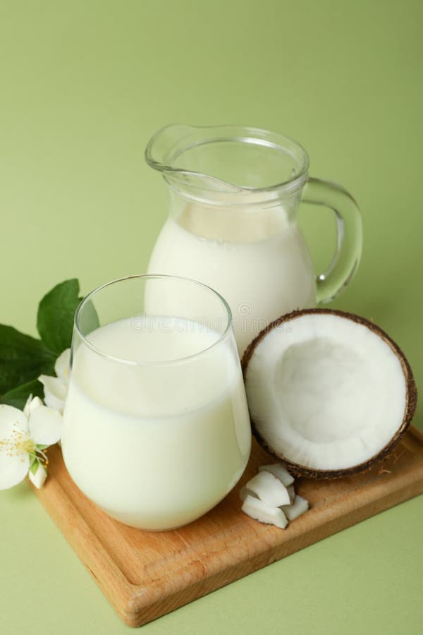 Milk and flowers stock image. Image of artistic, color 168407139