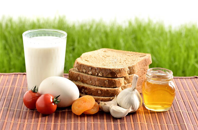 Milk, garlic, honey and egg with bread