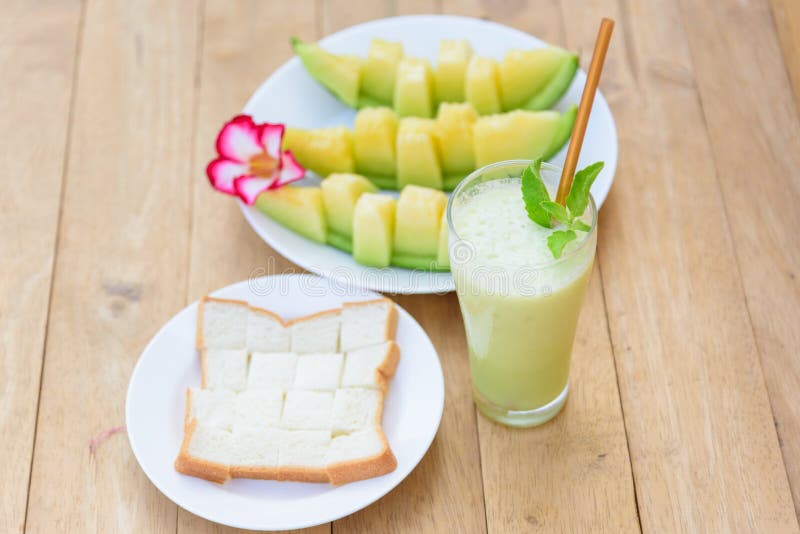 Milk Melon Smoothie in Glass with Roast Bread Stock Image Image of