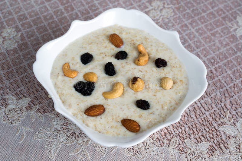 Milk Oatmeal with Nuts and Raisins Stock Photo Image of food, closeup