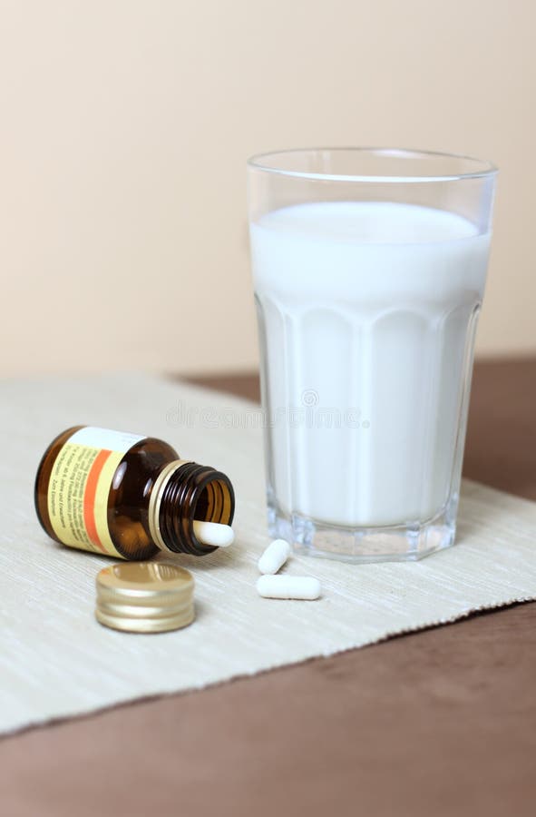 Milk Bottle Calcium Pills Stock Photos Free & RoyaltyFree Stock