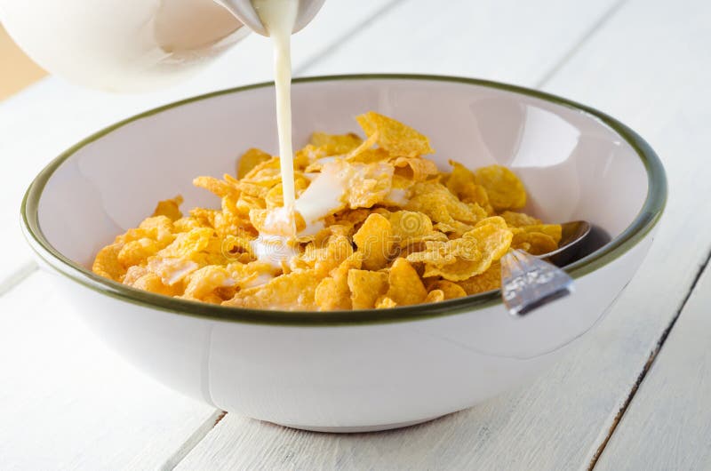 Milk Pouring on Cornflakes