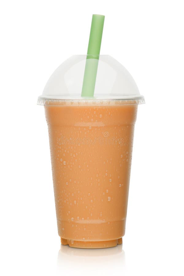Milk shake with orange fruit stock photos