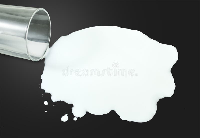 A Glass Of Spilled Milk On A Black Background. Stock Photo Image of